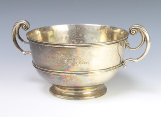 A Victorian silver 2 handled presentation trophy with scroll handles 30cm,  London 1897,maker Charles Stuart Harris 896 grams
