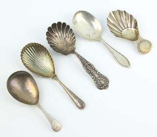 A silver caddy spoon Sheffield 1922 and 4 others, 78 grams