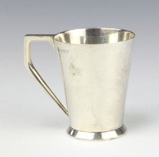 An Art Deco silver mug with angular handle Birmingham 1933, 8cm, 157 grams 
