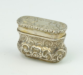 A Victorian repousse silver bombe shaped vinaigrette with floral decoration and grill, 3cm, 12 grams