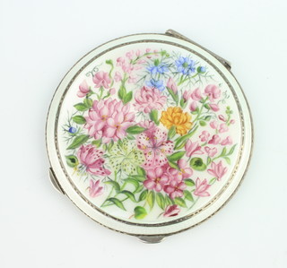 A silver and guilloche enamel compact, the champagne ground with spring flowers Birmingham 1952, maker HCD, 8.5cm  