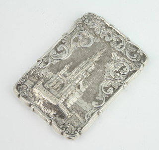 A VIctorian repousse silver card case decorated with a view of the Scott Memorial, the reverse with an engraved monogram to the cartouche, profusely decorated with scrolls and flowers Birmingham 1852, 10cm x 7cm, 68 grams