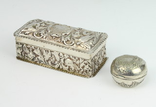 A Victorian rectangular repousse silver toilet box London 1890, maker William Comyns & Sons Ltd  together with a Continental repousse silver pill box, 106 grams 