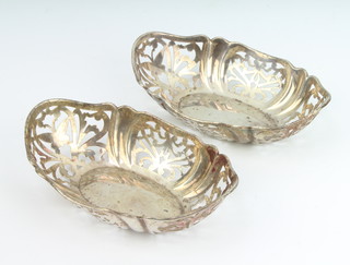 A pair of oval pierced bon bon dishes London 1929, 14cm, 114 grams