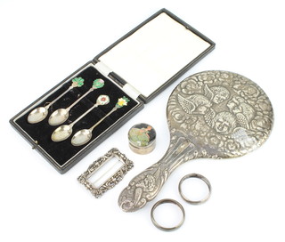 An Edwardian silver backed hand mirror with Reynolds angel decoration, 4 cased spoons and minor items 