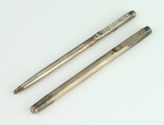 A silver fountain pen and a ditto ballpoint pen 