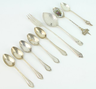 A silver pickle fork Birmingham 1947 and minor spoons 130 grams