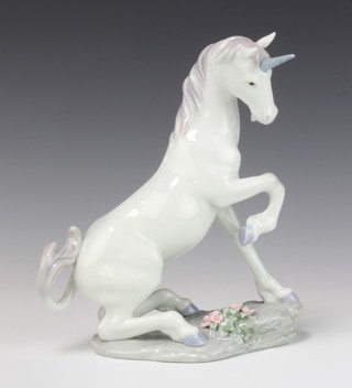A Lladro Privilege figure of a unicorn no.7697, 21cm, boxed 