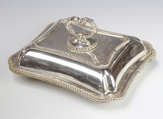 A rectangular silver plated entree set 