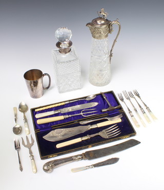 A pair of cased silver plated fish servers, claret jug, decanter and minor plated items 