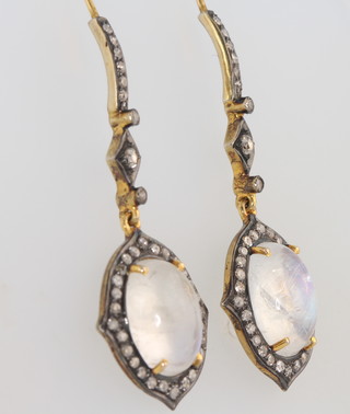 A pair of 14ct yellow gold moonstone and diamond earrings 46mm x 18mm 