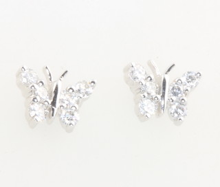 A pair of 18ct white gold diamond set butterfly ear studs 