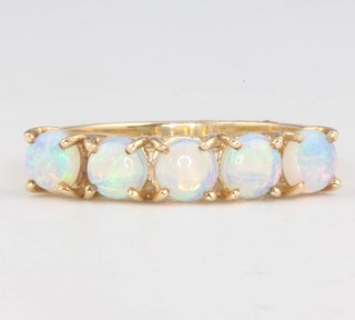 A 14ct yellow gold opal 5 stone ring size O  