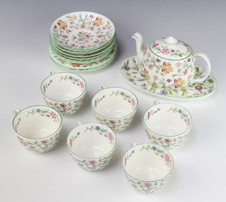 A Minton Haddon Hall part tea set comprising breakfast teapot, 6 cups, 6 saucers, 2 small plates and an oval serving plate 