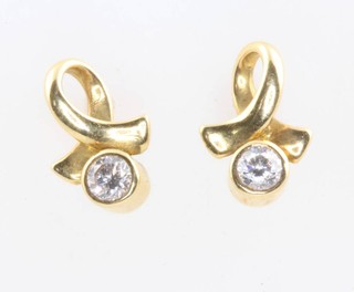 A pair of 18ct yellow gold single stone diamond ear studs, each approx. 0.15ct