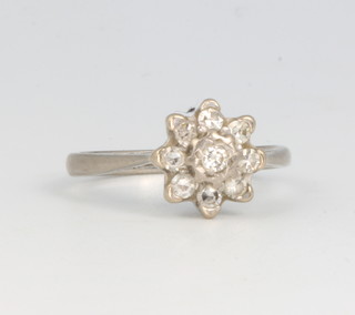 An 18ct yellow gold diamond cluster ring 3.2 grams 