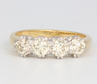 An 18ct yellow gold 4 stone diamond ring approx. 1.4ct, size N 1/2