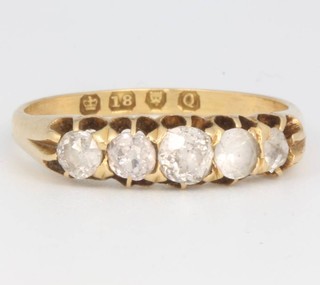 An 18ct yellow gold 5 stone diamond ring approx. 0.7ct, size Q 1/2