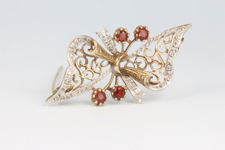 A 9ct yellow gold ruby and diamond floral brooch 47mm 