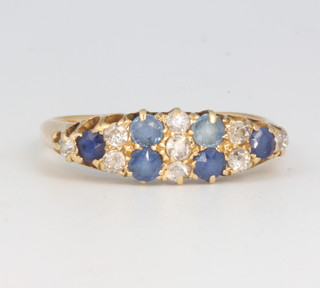 An 18ct yellow gold sapphire and diamond ring size O 1/2