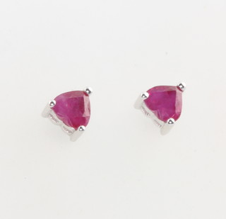 A pair of 18ct yellow gold heart shaped ruby ear studs 