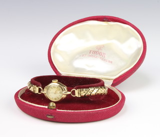 A lady's 9ct yellow gold Tudor wristwatch on an expanding bracelet in original box 