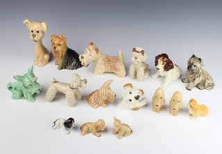A Sylvac figure of a Yorkshire Terrier 5027 13cm, a ditto of a spaniel 11cm and 14 other Sylvac dog figures