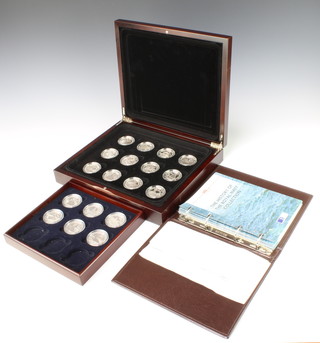 Eighteen History of the Royal Navy silver commemorative crowns, each approximately 27 grams, contained in a fitted box 