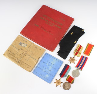 A World War Two group of medals comprising Africa Service medal, 1939-45 Africa Star with North Africa 1942-43 bar and a War medal, together with a South African Air Force identity card, South African Air Force Observer or Air Gunner's log book to R White a tie and minor cuttings