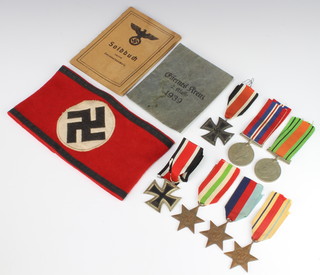 A World War Two group of medals comprising 1939-45 Italy, Africa Star, Defence and War medal and other minor medals etc 
