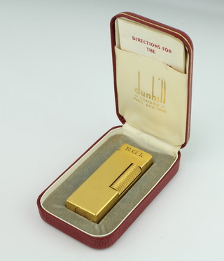 A gentleman's gold plated Dunhill cigarette lighter in original case 