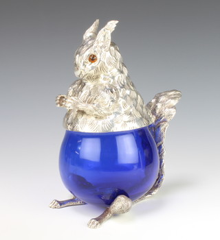 A plated mounted blue glass lidded pot in the form of a squirrel 25cm 