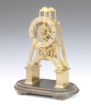 A Victorian fusee skeleton clock with silvered dial and Roman numerals 