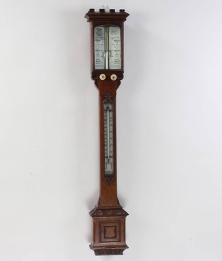A Victorian Standard Swift mercury barometer and thermometer, the indicator board marked Standard Swift 43 University Street, Fulham Court Road, London, contained in a gothic carved case 
