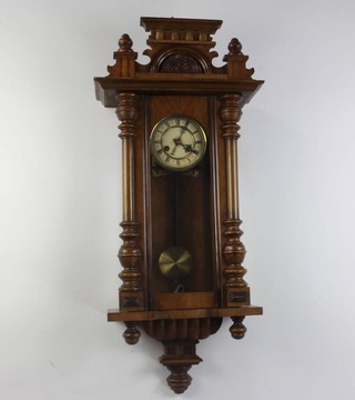 A Vienna style striking regulator with 13cm copper dial contained in a walnut case  