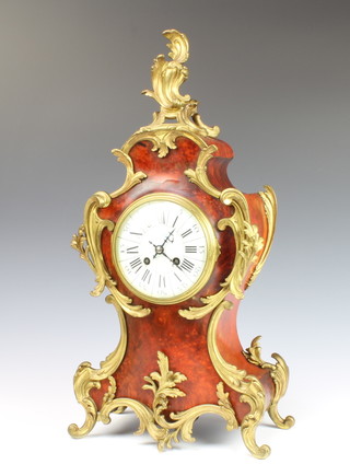 Japy and Co, a 19th Century French striking on bell mantel clock with enamelled dial and Roman numerals contained in a tortoiseshell and gilt metal mounted case, the  back plate marked Japy and Co 3710 6, complete with pendulum and key 