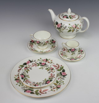A Wedgwood Hathaway Rose tea and coffee set comprising teapot, 6 coffee cups, 6 saucers, 9 tea cups, 9 saucers, 8 small plates, 1 sandwich plate, sugar bowl and cream jug 