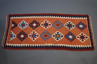 A tan ground Moroccan Kilim rug with 14 diamonds to the centre 192cm x 85cm  