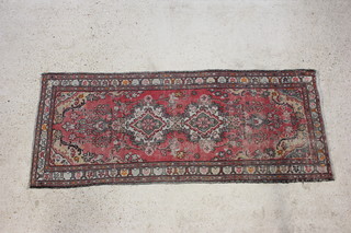 A red and blue ground runner 203cm x 84cm 