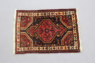 A brown and yellow ground Persian Tafresh rug 82cm x 59cm 