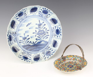 An early 20th Century Japanese scallop plate decorated with stylised flowers 28cm and a Quimper style dish with silver mount