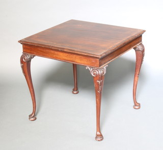 A Georgian style square mahogany occasional table, raised on carved cabriole supports 71cm x 76cm x 76cm 