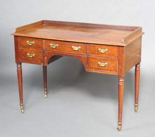 A 19th Century mahogany wash stand with 3/4 gallery fitted a drawer flanked by 4 short drawers raised on turned supports 89cm h x 118cm w x 58cm d 