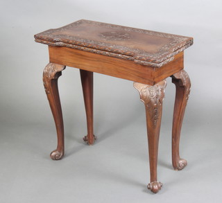 An Anglo Indian carved mahogany Chippendale style tea table on cabriole ball and claw supports 72cm h x 76cm w x 37cm d 