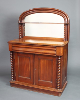 A Victorian mahogany chiffonier with arched raised mirrored back supported by a pair of spiral turned columns, the base fitted 1 long drawer above a double cupboard flanked by spiral columns, raised on a platform base 161cm h x 105cm w x 47cm d 