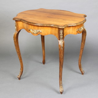 A Victorian Continental shaped rosewood centre table with gilt metal mounts, raised on cabriole supports 74cm h x 79cm w x 62cm d 