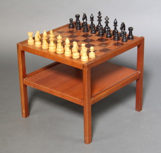 A.H. McIntosh and Company, a mid 20th Century square teak and rosewood veneered 2 tier chess table complete with turned wooden chess pieces 45cm h x 49cm x 50cm 