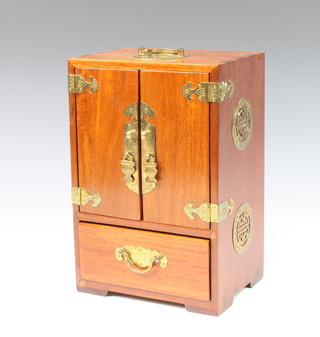 A Chinese hardwood table top cabinet, fitted 4 drawers enclosed by a panelled door, the base fitted 1 long drawer with brass mounts throughout 30cm x 20cm x 15cm d 