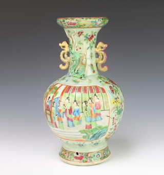 A 19th century celadon famille rose baluster vase with dragon handles and panels of figures in pavilions 34cm