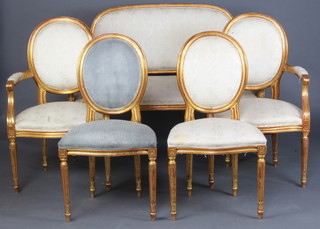 A gilt painted salon suite comprising 2 seat settee, 2 armchairs and 2 side chairs 